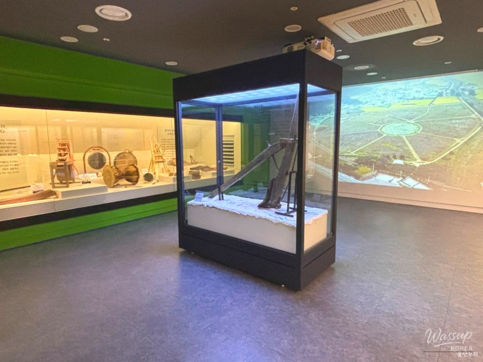 Children enjoying hands-on historical learning inside the exhibition hall