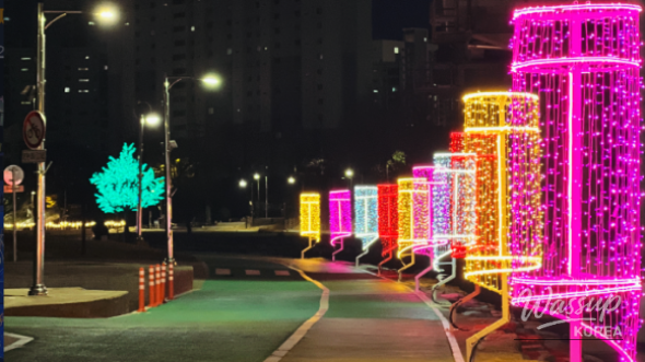 Children’s play area with character lanterns and dandelion-shaped lights