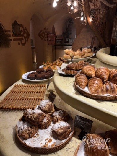 Self-service area with trays and cutlery at the bakery