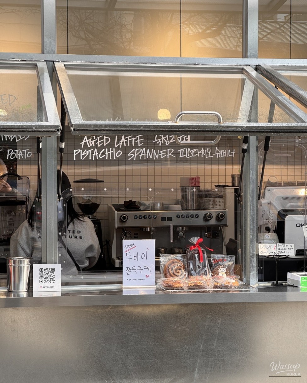Takeout-focused counter setup inside Exit Cafe