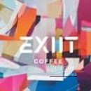 Industrial-style interior of Exit Cafe with stainless steel and graffiti elements