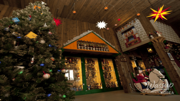 Warm interior of Jeju Bainachtun Christmas Museum filled with ornaments