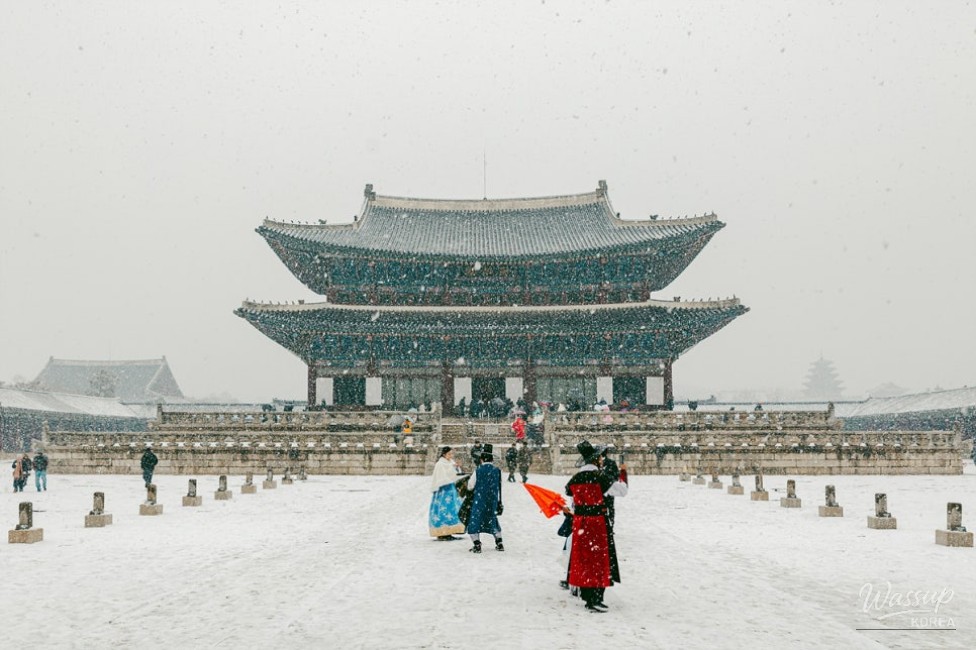 Geunjeongjeon and surrounding palace grounds covered in snow during winter at Gyeongbokgung