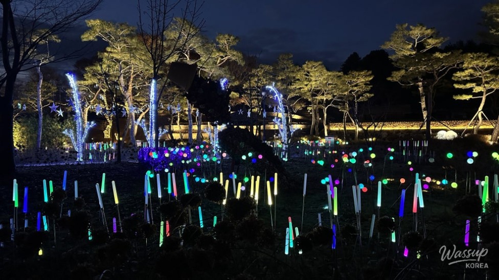 Evening view of the riverside park illuminated softly in Goesan