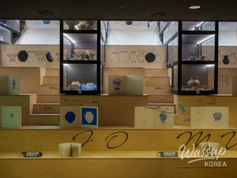 Outdoor area featuring a model of the five-story stone pagoda and walking paths