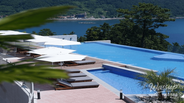 Cozy private heated pool area with a scenic view of the surrounding landscape