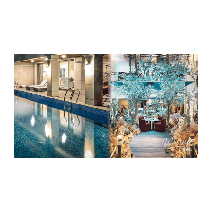 A luxurious rooftop heated pool with a stunning night view of the city skyline during winter