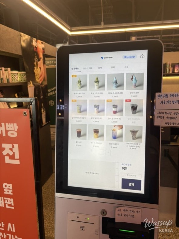 A warm bowl of Busan style pork soup served with side dishes
