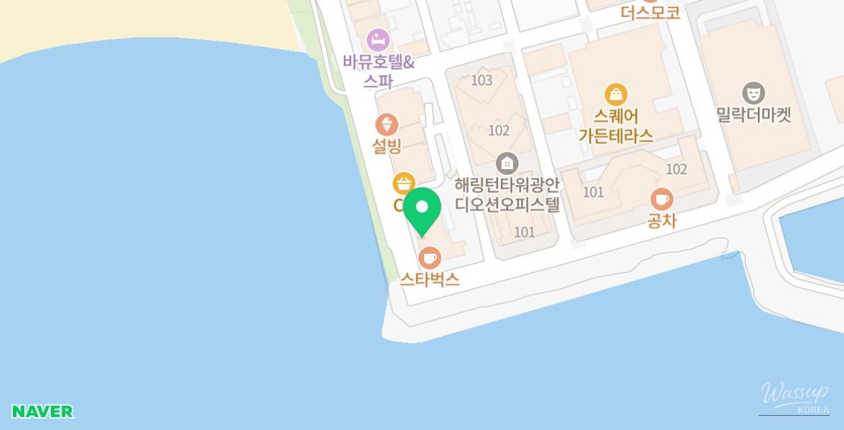 Interior of an ocean view screen golf room in Busan overlooking the bridge