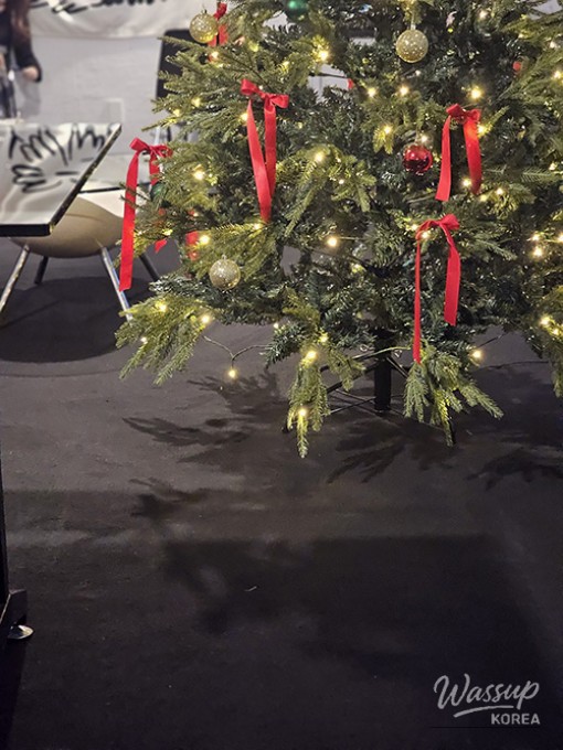 Snow-covered trees in a Seoul park during twilight