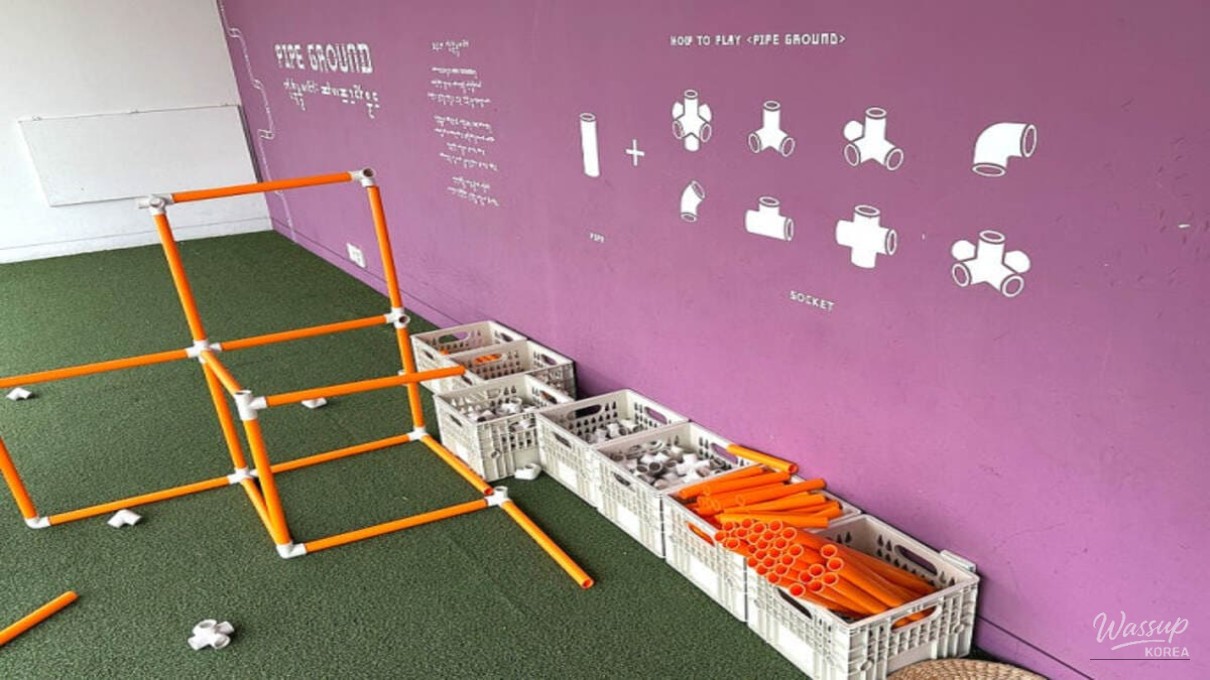 The warm and inviting glass-walled café overlooking the museum's outdoor courtyard