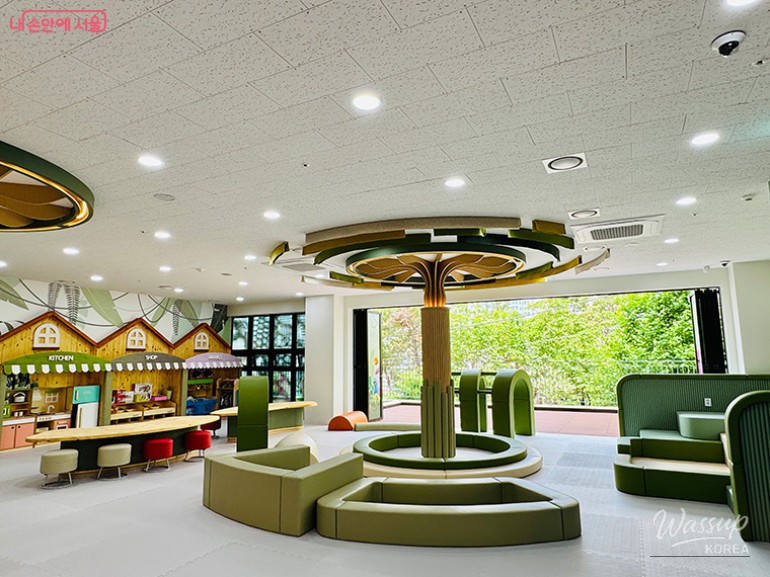 Children exploring the sensory exhibits in a safe indoor environment