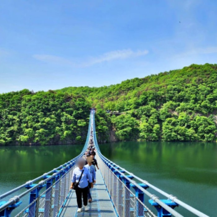Panoramic view of the Mir309 Suspension Bridge stretching across Chopyeongho Lake in Jincheon