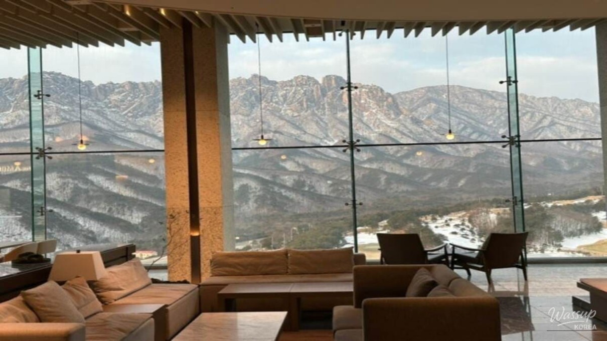 Postcard-worthy winter scenery of Ulsan Rock under a clear blue sky at The Ambrosia