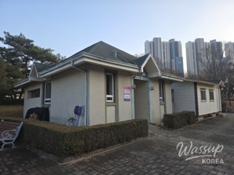 The moon and heart shaped sculpture and traditional pavilion in the center of Wonpyeong Park