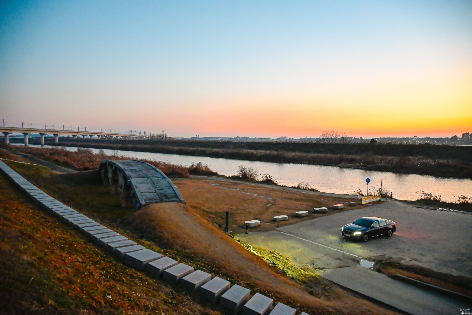 Local walking and cycling paths along the river near Mineda Bridge at dusk