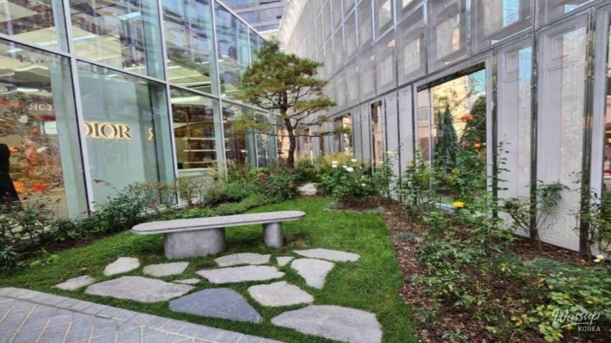 The central garden at Dior Seongsu viewed through the expansive glass walls