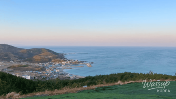 Traditional hanok houses with snow covered roofs at Gyeongju Yangdong Village