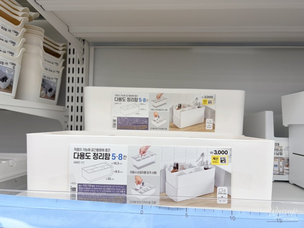 Organized baby care supplies including storage boxes and thermo-hygrometers from Daiso