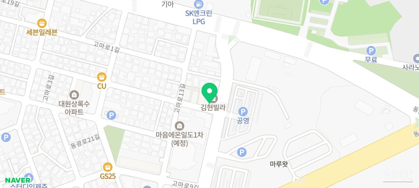 The warm wooden interior and inviting atmosphere of Mungeya restaurant in Jeju