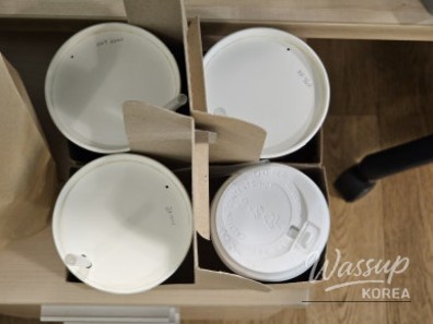 Assorted drinks prepared for takeout at the counter