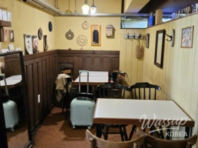 Close-up of the cafe's unique illustration-style branding