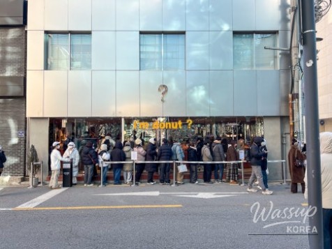 Minimalist storefront and cute character mascot of I'm Donut in Seongsu Cafe Street