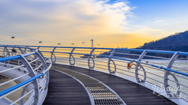 Beach train running along the winter coast at Haeundae Blue Line Park