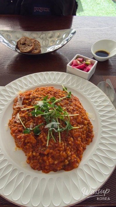 View-focused seating area inside Adela Bailey cafe
