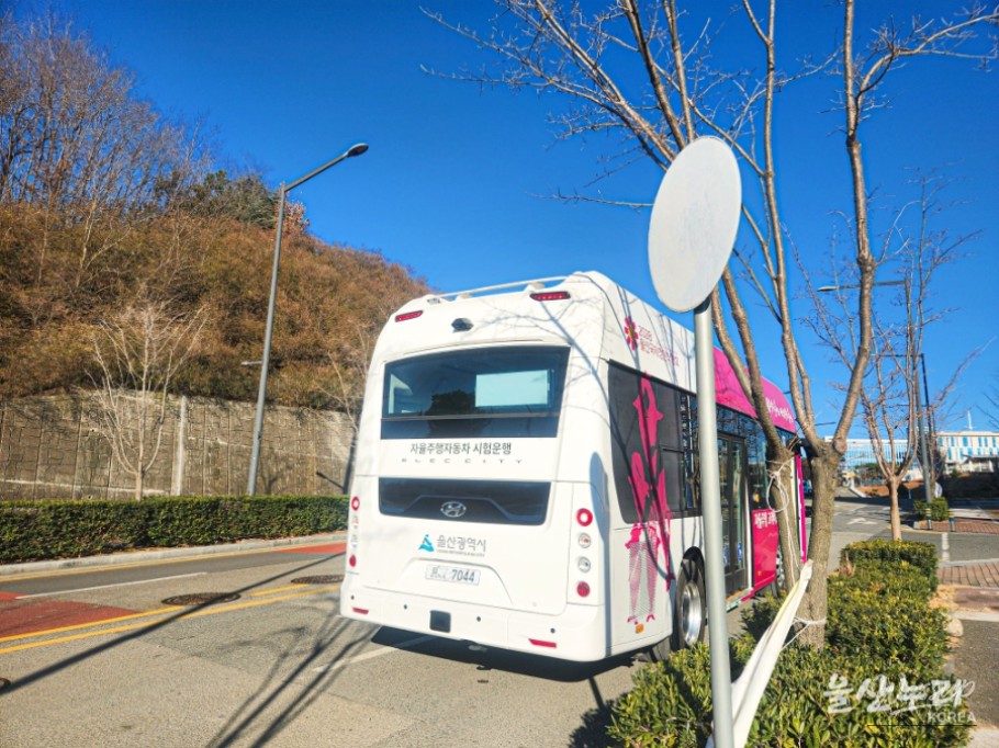 Interior of Ulsan autonomous whale bus showing passenger seating and monitors
