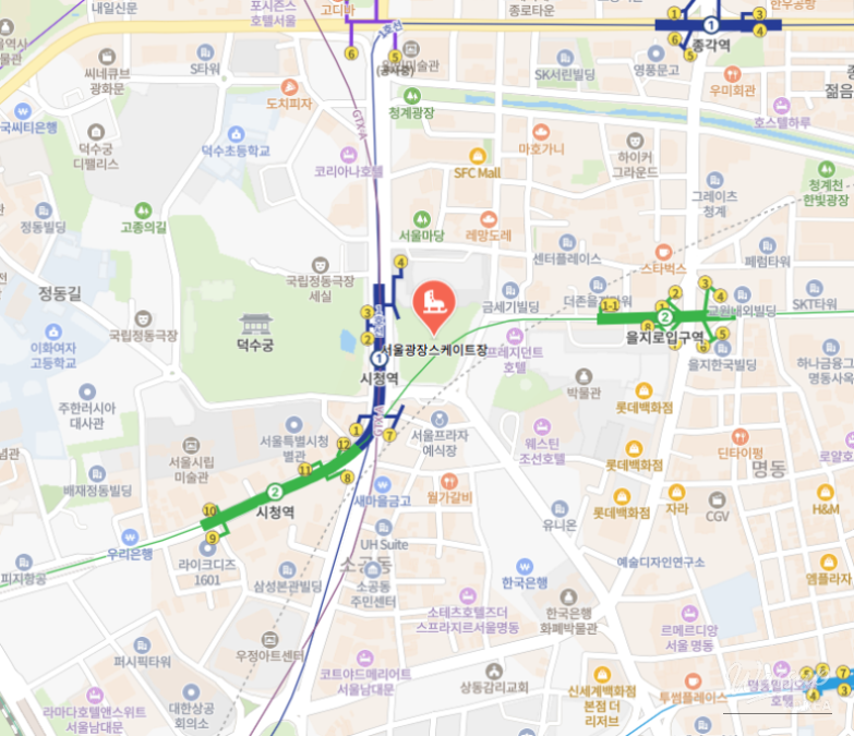 Children enjoying sledding at Han River Park sledding hill in winter