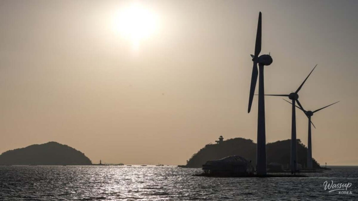 Three large wind turbines at Tando Port creating a European-style coastal atmosphere in winter