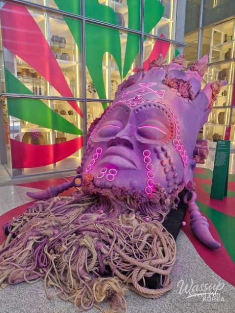 Visitors enjoying the immersive atmosphere of the Rio Carnival exhibition