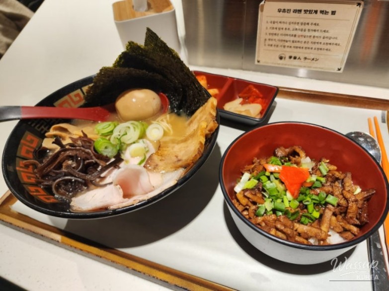 Donkotsu shoyu ramen with chashu, chicken breast, and soft-boiled egg at Uchu-jin