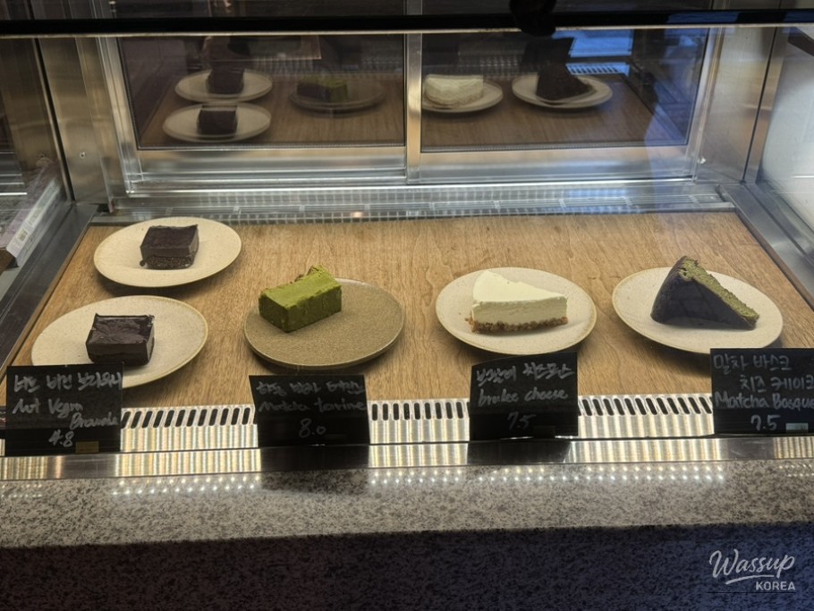 Cafe interior details highlighting plants and natural decor