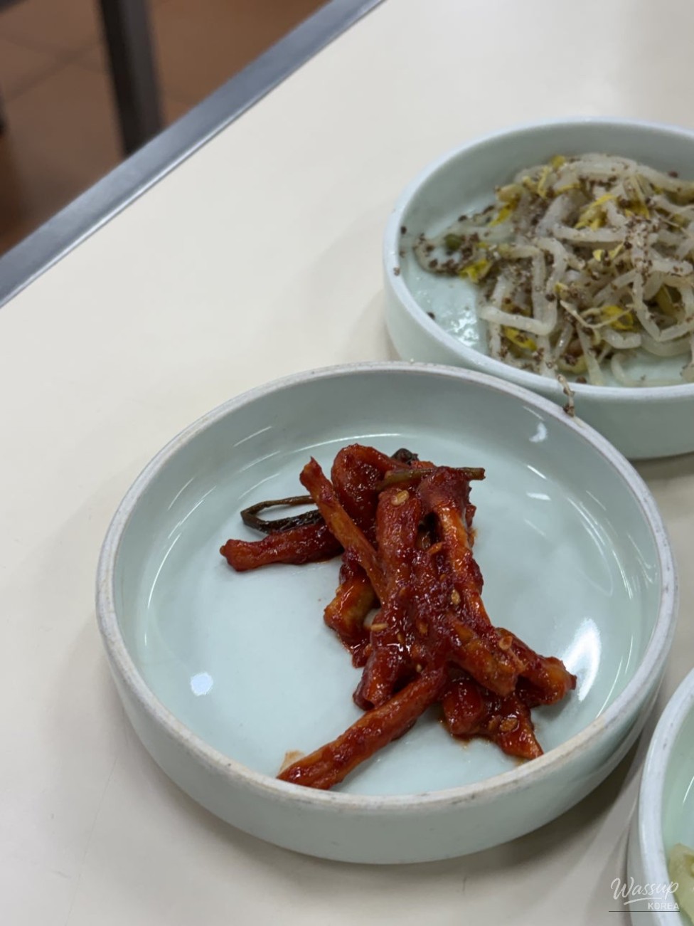 Menu and pricing board at Gom Naengmyeon