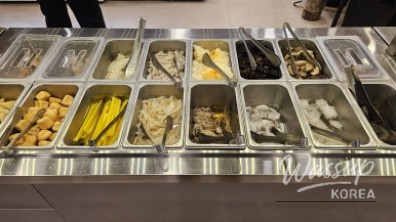 Full hot pot table setup showing generous portions and variety