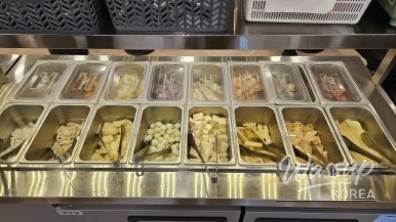 Satisfied diners enjoying a complete shabu shabu meal