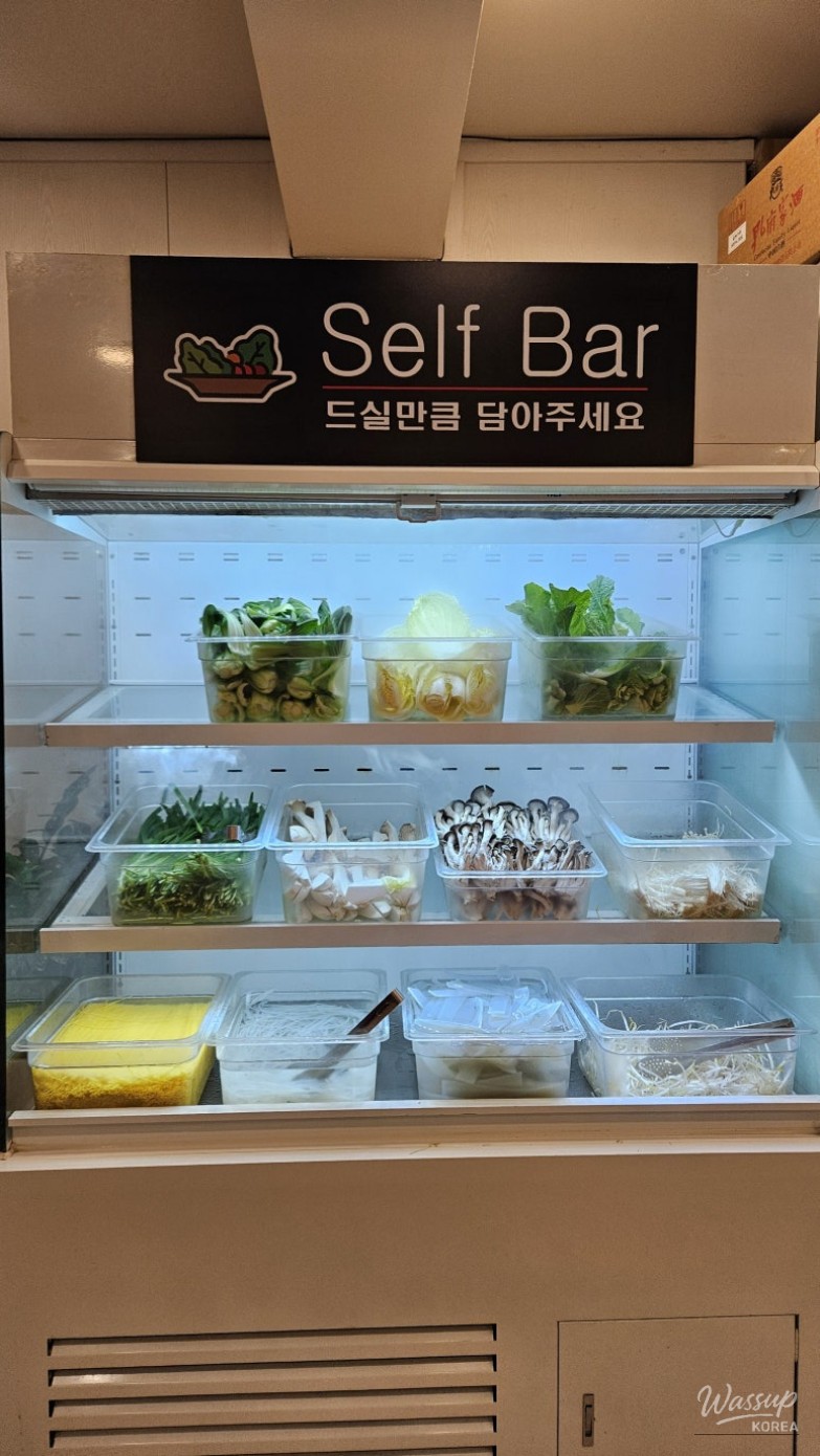 Close-up of vegetables and noodles ready for hot pot cooking