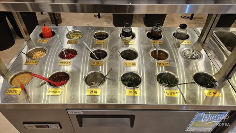 Sauce bowls prepared for dipping shabu shabu ingredients