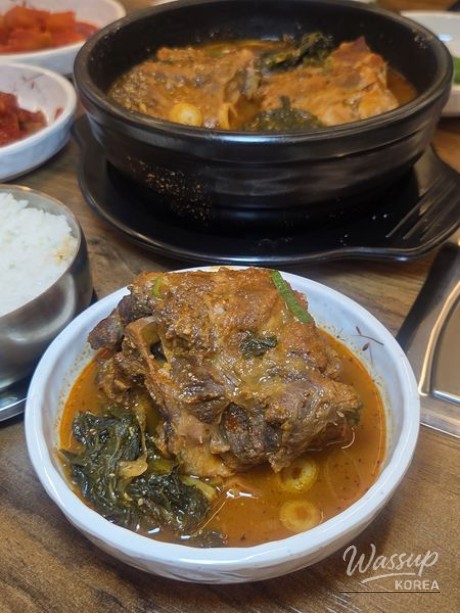 Close-up view of hearty Korean soup ingredients in the broth
