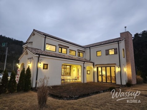 Warm interior with fireplace creating a cozy photo spot inside Airo Cafe