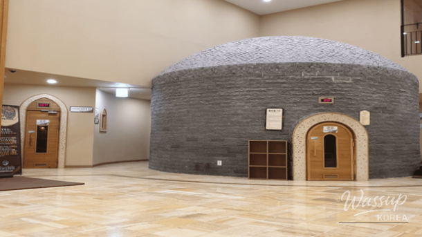 Traditional jjimjilbang facilities and charcoal fire pit area at Sirala Jjimjilbang