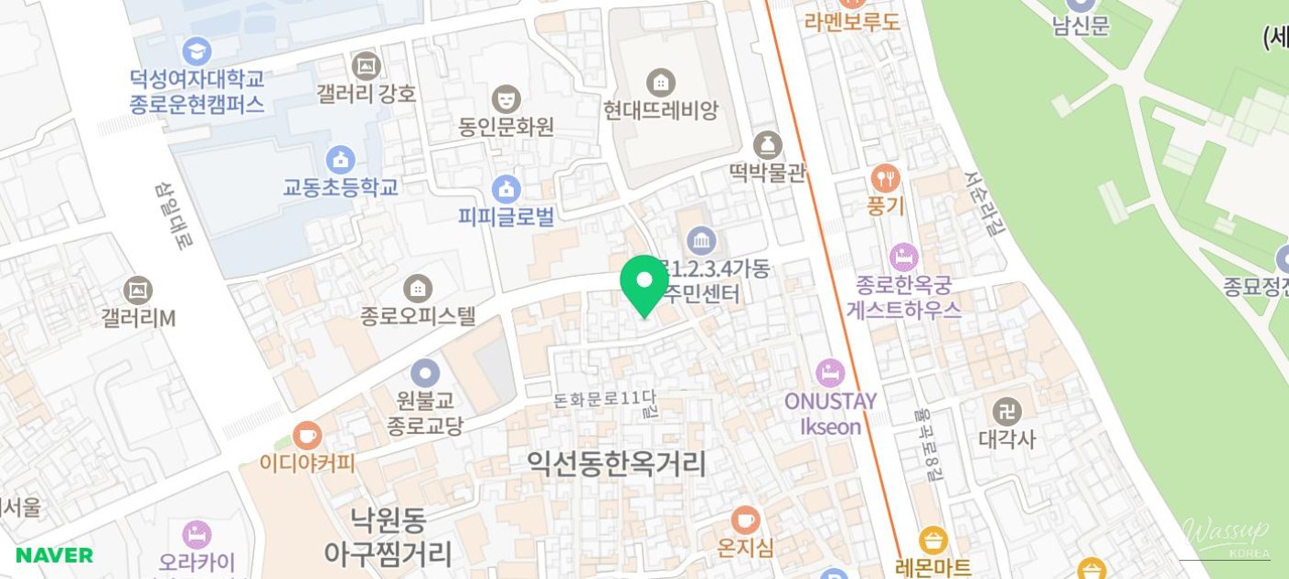 Evening dining atmosphere at Ibaekjeom Meat Restaurant in Ikseon-dong