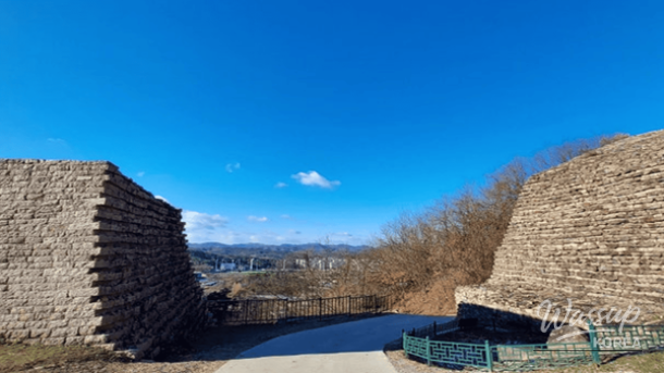 Snow-covered stone walls of Samnyeonsanseong Fortress in Boeun