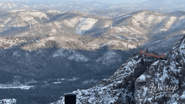 Wolchulsan Cloud Bridge surrounded by winter snow and open mountain views