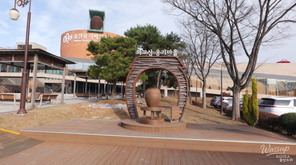 Artisans shaping traditional Ongi pottery in narrow alleys of Ulsan Ongi Village