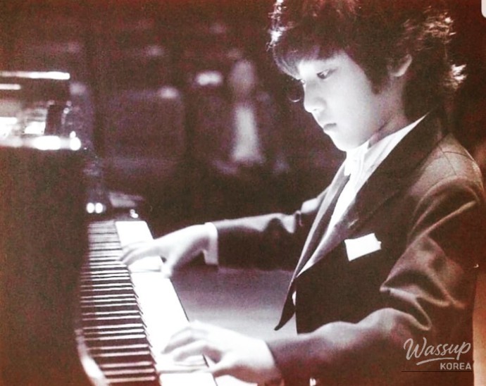 Pianist Lim Yoon-Chan performing on stage with deep concentration
