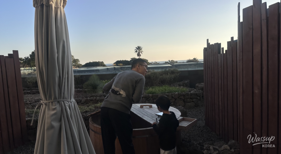 Winter night bonfire event with roasted sweet potatoes at JW Marriott Jeju