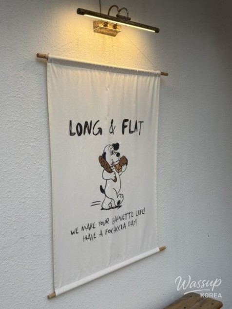 Cozy interior and creative baking room details at Long & Flat in Jeju